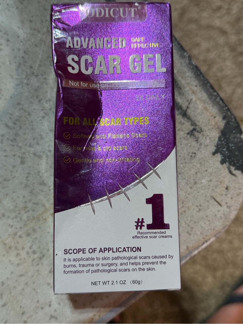 Source Unknown Advanced Scar Gel - Purple and White Packaging